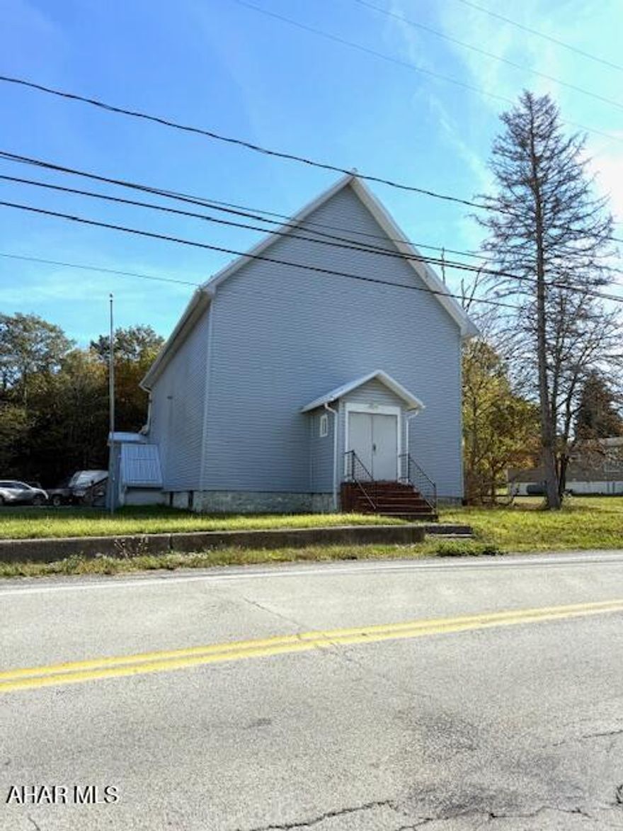 Welcome to 1032 Skyline Drive in the quiet, rural community of Blandburg, PA. This versatile 2,000+ sq ft building was formerly used as a worship center, and it's ready for its next chapter. With a brand-new roof and siding already in place, this property is a very attractive candidate for
adaptive reuse — whether you're envisioning a place of worship again, converting to a business with office space, or turning it into a spacious single-family home or Airbnb. Inside, you'll find a large, open main area that's perfect for gatherings, plus a few separate office
spaces that provide flexibility. There's also a generous amount of storage throughout, giving you the ability to optimize the layout in a way that works for your needs. Situated in Reade Township, the property is part of a peaceful, wooded residential environment, along Skyline Drive (PA Route 865) which offers scenic views and a sense of privacy Key Features:
• Building Size: ~2,000+ sq ft
• Roof/Siding: Newer roof and new siding help reduce immediate maintenance costs.
• 200 Amp Services
• Flexibility: Previously a worship center — very adaptable for business, community use, or residential conversion.
• Storage: Ample storage space for various uses.
• Paved Parking and handicapped access.
• Non Zoning
This is a rare find in the area — a commercial building with strong bones and great location.