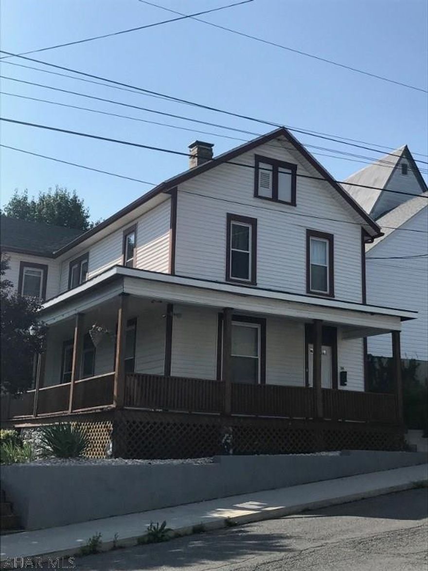 The perfect family home, spacious and well built. New 200 amp electrical, all new windows, updated kitchen, so many possibilities with this one. Endless storage, closed in porch area/laundry, den/office with half bath (or fifth bedroom!) Just painted wraparound deck. Nice and spacious private yard for in town with back porch. Large parking area with 4-5 off street parking spots. Attic runs full length of house for even more storage. Upstairs features 4 bedrooms with a bonus room. Hardwood floors in some areas, and underneath downstairs carpeting. Lots of character and plenty of space! Set up your showing today.