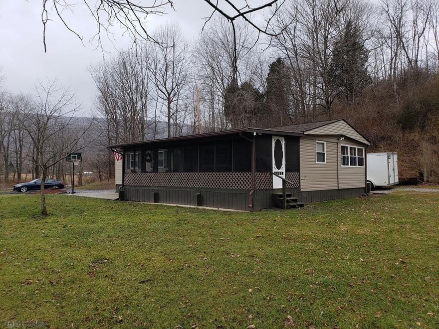 Frankstown township mobile home on 2.63 acres. This lovely property has great space for entertaining outside. The screened porch is great for morning coffee or additional space to entertain. The addition is a great space for the laundry room. Many upgrades include: new roof, furnace, hot water heater, enclosed porch, and much more! Call listing agent for more information and your private tour.