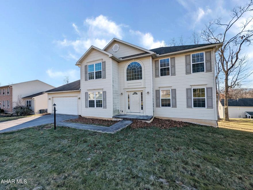 Loads of potential and possible upside with this Chapel Hill 2 story vinyl home. Ample living space with formal first floor living room, dining room and eat-in kitchen with adjoining great room plus half bath.  Second floor features 4 full bedrooms, 2 baths including master suite. 2 car attached garage, nice yard and loads of possibilties. Better check it our before it's too late! AS-IS sale, seller will make no repairs. Photos are digitally enhanced.