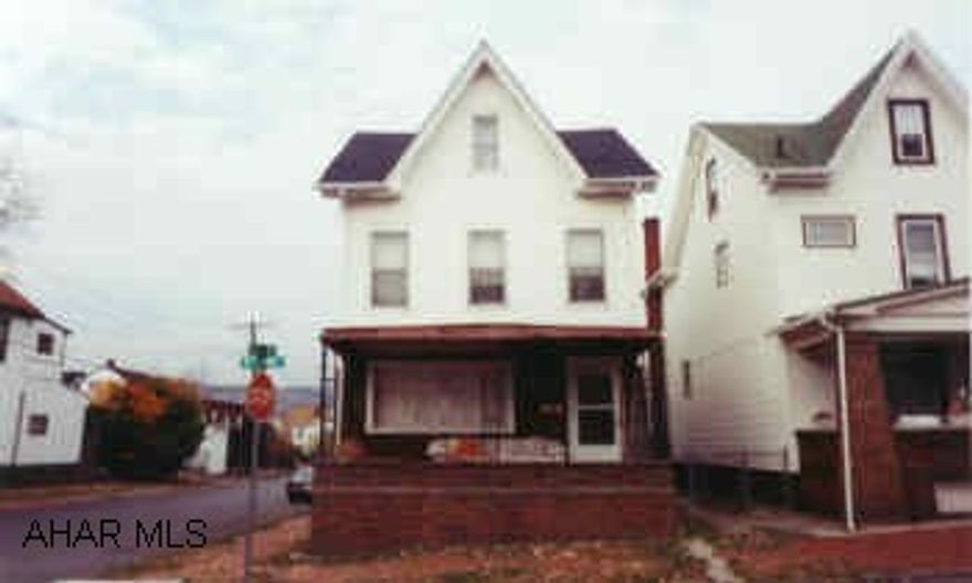 2 story 3 bedroom - 1 bath, needs some TLC.  Good investment or first time buye. "Sold as is." Vinyl and wood siding, new roof, fence in corner lot.  Needs some TLC, being sold as is.