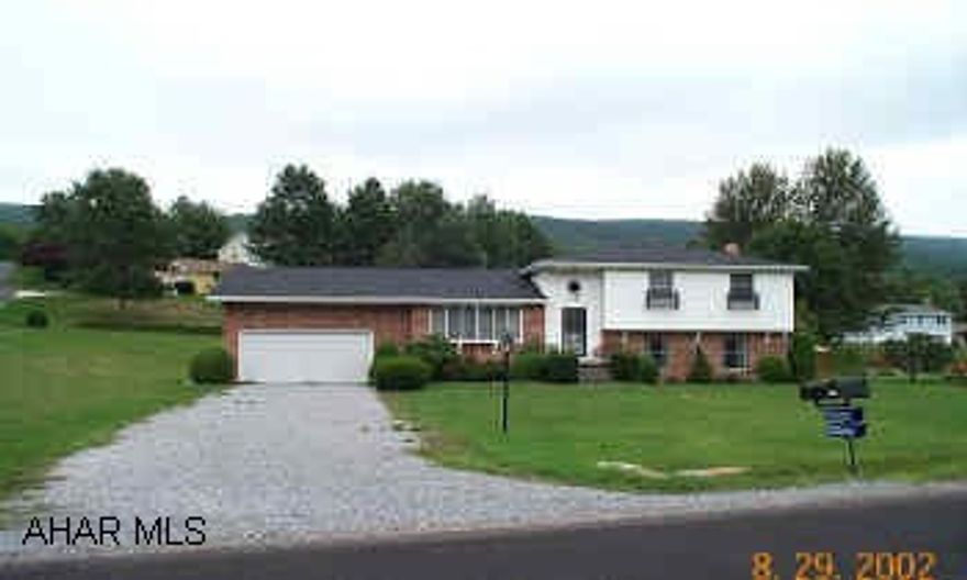 4 levels - game room in basement - FR w/ fireplace and bar - new 15x25 deck - very well kept.
