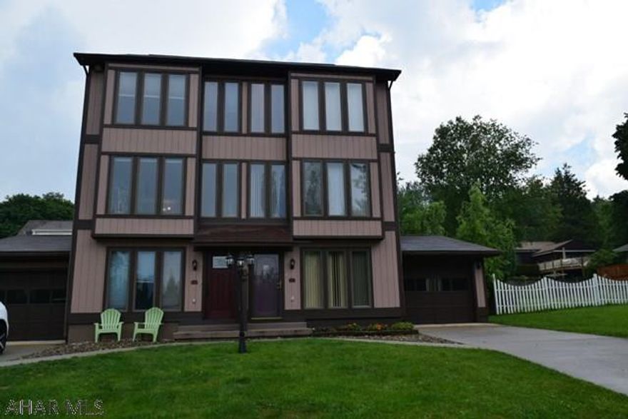 Great 3 bedroom town home with attached garage and two enclosed porches at the end of a quite lane. Only minutes to shopping, elementary school and I99. This is one of a two unit independent condo.