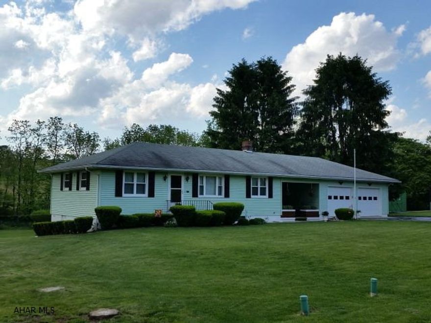 Well cared for vinyl-sided 3 bedroom, 2.5 bath home with breezeway, 2 car garage. Hardwood under carpet. Peaceful setting, 2 sheds, mostly vinyl windows. Nice flower garden.   #J-291