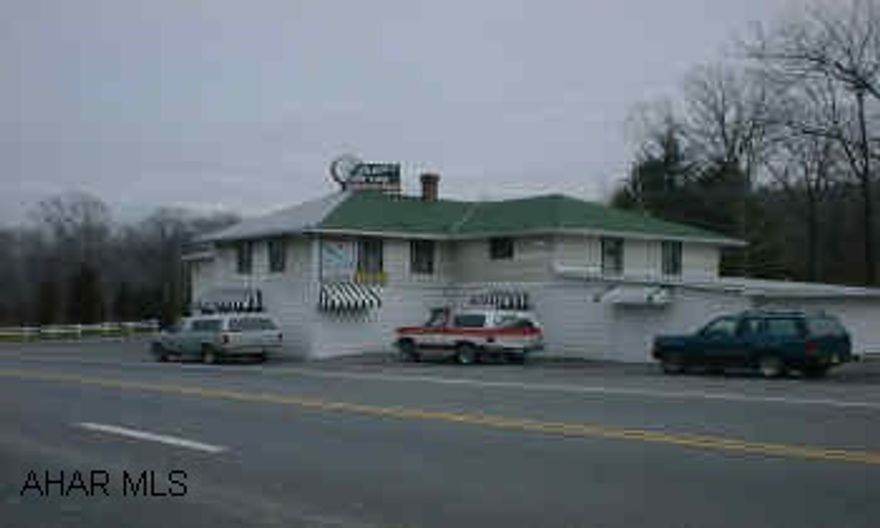 Qualified buyers only Famous area restaurant and lounge includes: business, real estate, equipment and liquor license, and good will.  Only liquor license in Catherine Township.  New sewer treatment facility on site.