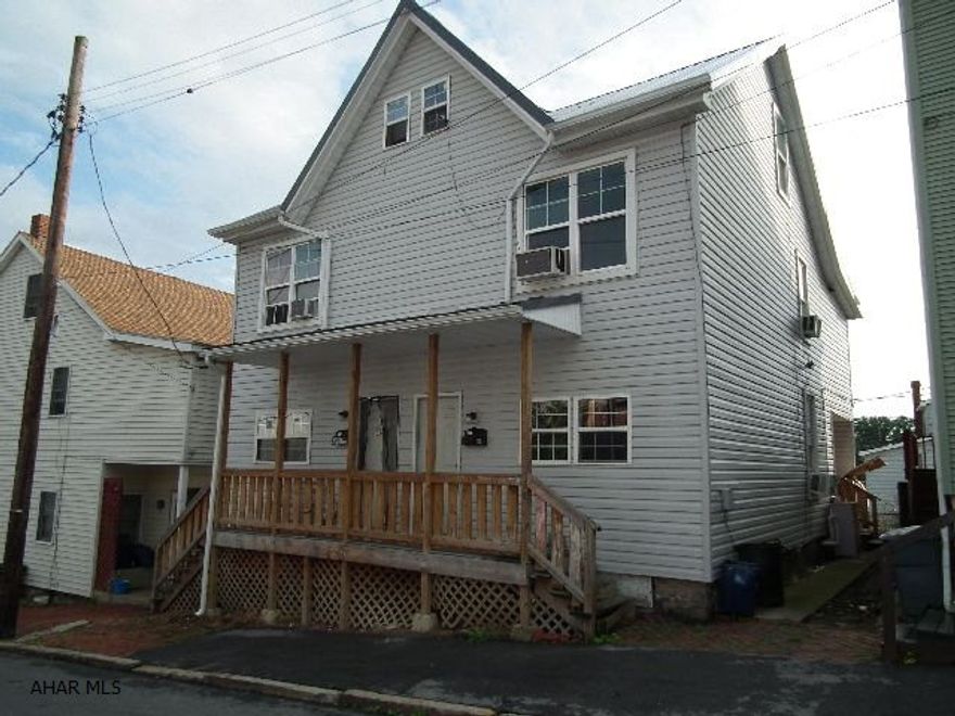 Investment property with tenants and leases. The property was completely renovated, stripped down to studs in 2007, new metal roof. Tenant occupied with leases. Tenants pay utilities. Investors buy now for immediate profit.