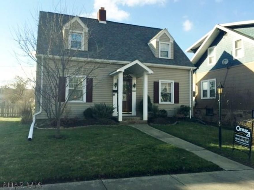 Charming cape on Lark Ave! This home invites you into a spacious LR w/ gas fireplace, DR., w/ HWF opens into the vintage kitchen w/banquette seating. 1st floor 1/2 bath too! 2nd floor offers 3 bedrooms and full bath. Enclosed porch, fenced yard w/ swing & detached 2 car garage complete this property!