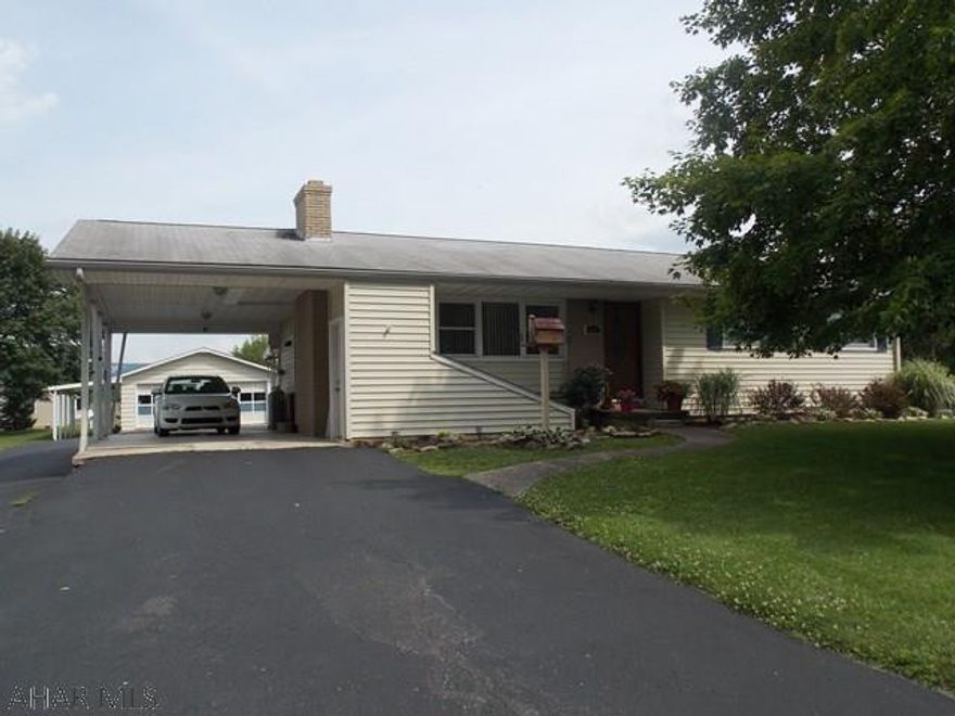 This one will not last. 3 Bedroom, 2 bath ranch on a flat lot with 2 car garage. Living room has a beautiful fireplace, kitchen has oak cabinets and ceramic tile floors and the master bedroom is huge with two closets. The one bedroom is used as an office and the other has an attached bath.  The finished basement is sure to please everyone with a TV area, game area and a bar. The windows have been replaced and the electric heat is a heat pump. The Central Air will keep you nice and cool this summer. Outside there is plenty of parking plus the 2 car garage. Lots of storage, great neighborhood in Hollidaysburg School District, great house! Taxes are Estimated.