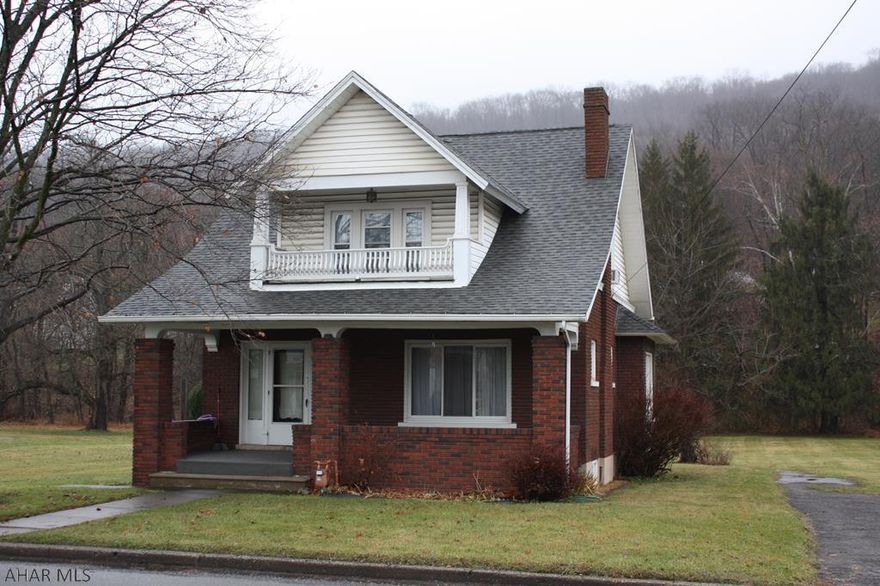 Solid Brick Home.Roof is new in the last 3 years vinyl windows and Beautiful Interior oak trim with built in's.  Large relaxing front porch, there are beautiful built in window benches and  between the dinning room and living room are  built in original glass door display cases.  The 3 Bedrooms have lots of closet space.  The large yard is great for play or entertaining and if you like to fish way down yonder, 237 feet at the end of the yard is a large stream.   Young Insurance in Tyrone quoted Flood Insurance  for a property of this value at $701.35, contingent to under writers approval. This property is priced to sell.