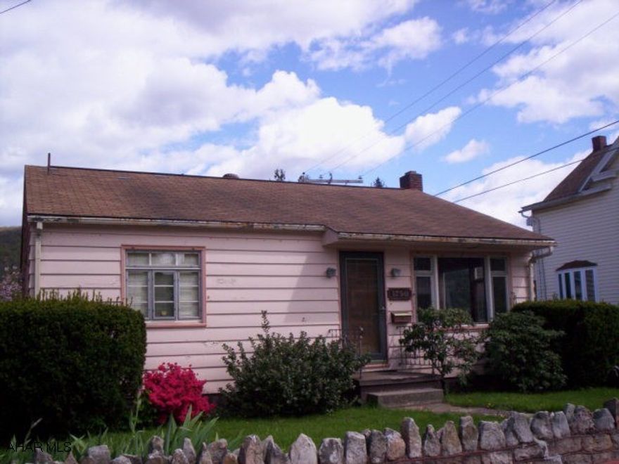Nice 2-bedroom includes 2-Car detached garage, covered patio and fenced yard. Would make a very nice starter home.