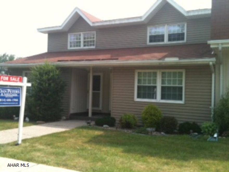 Nicely maintained home! Move in ready! Desirable area! Many updates. Newer flooring. Must see! Will not last long. Immaculate. Homeowners fee of $185 inludes water/sewer/ softner/trash/lawn care/snow removal and outside maintenance of building. Great views of park. covered back porch. Home warranty included. Would make a nice investment property!