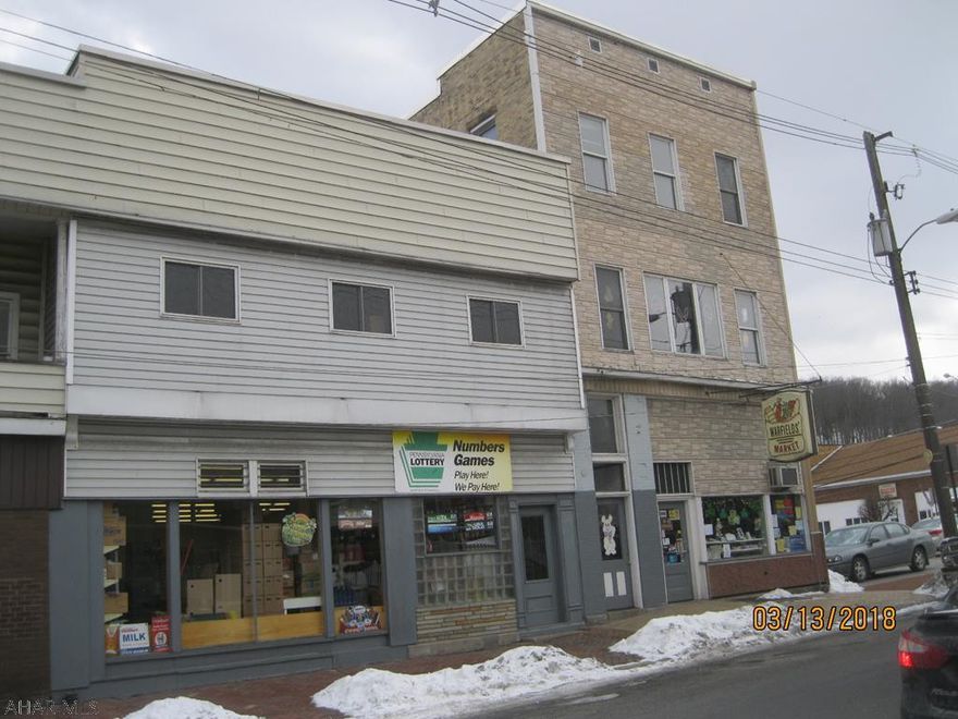 24 hour notice to show. Good sales history. Nice side parking lot. Updated second floor apartment.