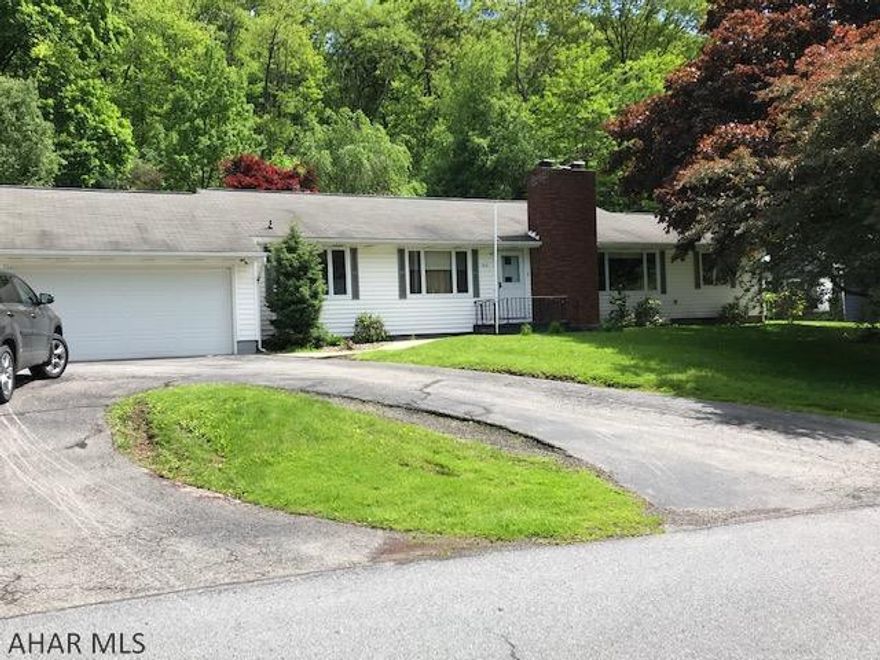 One story living in great setting in Juniata Gap, minutes to town!  3 BR, 3 BA, private deck, 2 car garage with gas hot water heat and central air.  Call listing agents for private showing.  Owners believes there are hardwood floors but don't guarantee that.