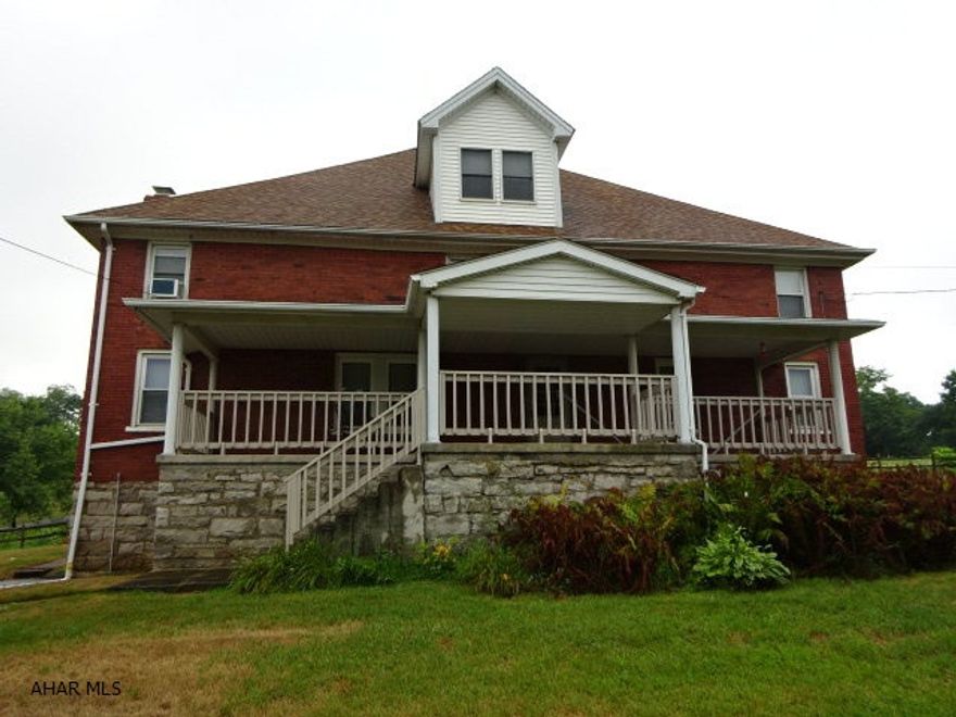 Large 2 Story Brick Home 4 BR 1 3/4 bath. Some rooms not heated. Was at one time a duplex. Could easily be converted to duplex again. Unfinshed third floor. Part of basement is dirt. One car built in garage. Will not qualify for FHA, USDA or VA due to the unheated room. Being sold as is.