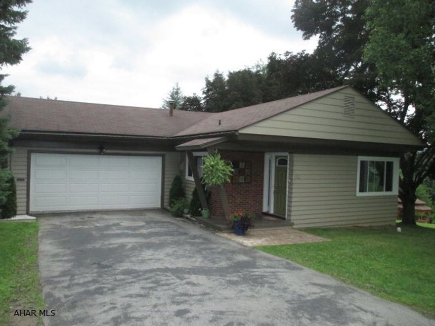 Lovely home and ready to move in. Updated kitchen and bath, totally remodeled. Lower level with new bath, kitchen, bedroom and family room. Beautiful view on 4 city lots - walk to Highland Park. Stamped concrete patio and 2 car garage. Nice as can be!