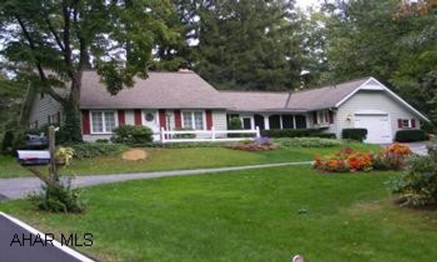 One of the most charming Cape Cod homes on a stunning gardener's paradise lot. Newer kitchen, heating system and public sewer 2008. Easy living on one floor. Darling patio and gazebo/carport. Family room can be converted back to a garage. Call Dianne 329-1856