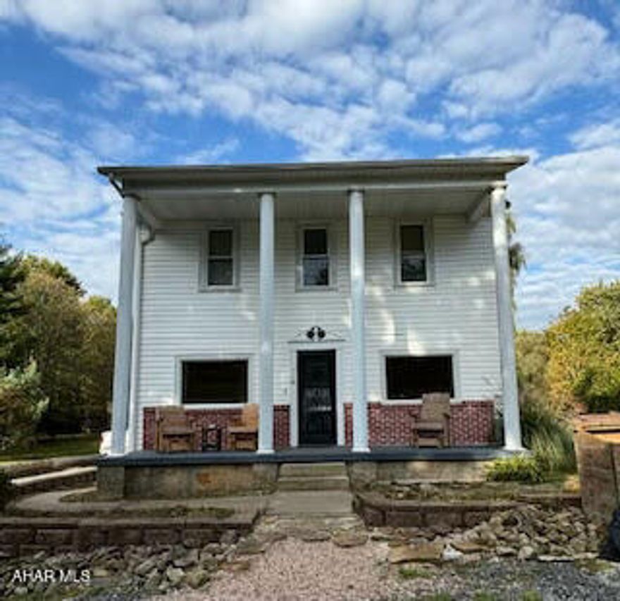 The basement has a finished wood ceiling and carpeted floor.