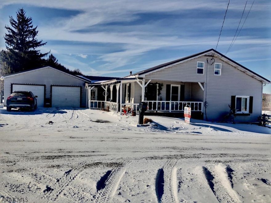 This Spacious home could not be nicer! The possibilities really are endless with this amount of space.Upon entering the foyer is warm & welcoming.The kitchen is big enough for an island or a family sized table,New Stainless Steel appliances,a Stunning quartz backsplash,cabinets galore,and a charming country feel.LR & DR are being used as an oversized Living area but can be used to suit your family.Propane FP,lots of natural light,and beautiful laminate floors make for a relaxing space that needs only your decorating touches.The Master BR is jaw dropping with a huge closet,access to the patio and pool,and big windows. Lower level family room is so quaint and a great place to send the kids! 2 BR's down here and 2 Baths as well. Upstairs is another finished/heated room. Oversized 2 car garage