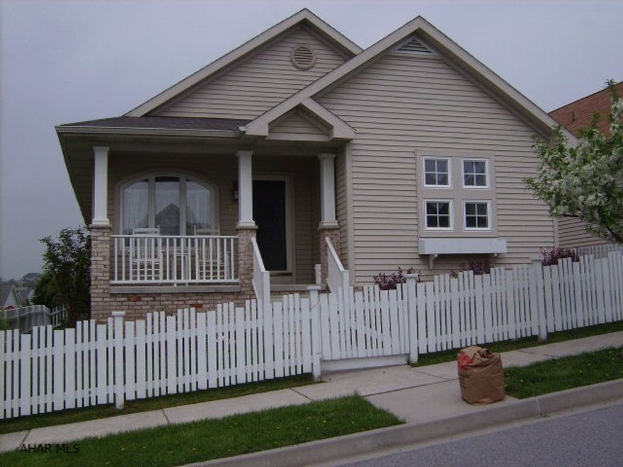 Cheerfully Decorated And Just The Right Size!!  Holliday Hills Cottage 1071 Sq. Ft. W/Attached Garage, Huge Deck, Hardwood Floors, Skylight, Enclosed Yard Good For Pets - New In 2004 - Seller May Leave Dining Table, Chairs & Buffet, Living Room Couch, Chair & End Tables & Small Bookcase In 2nd BR - Wonderful View From Deck - Nicely Landscaped - Basement Could Be Finished.