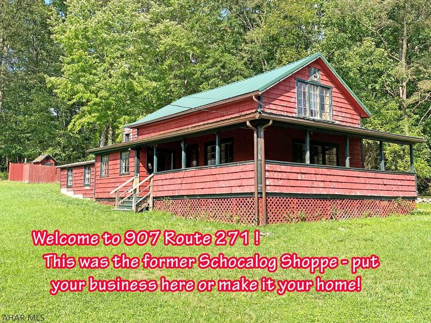 Former Schocalog Shoppe-successful business for 20 years! Lots of possibilities! Appx.2600 sq. ft. of space. 1st floor has 3 large showrooms. Propane free standing fireplace & some electric baseboard heat. 2nd floor has large room, landing area, attic storage. Metal roof on main building. Wrap around porch. Lots of history to the building-original section was once a 1 room schoolhouse moved from Bolivar Twp. Well head in the yard near the front steps (not plumbed inside). Public water available through MAWC-tap-in $2700. Property was perc tested. Currently outhouse only. Great location for retail business - or use as cottage - or add the finishing touches to make this your home. Or live & operate your business here! 1 acre lot is half wooded.