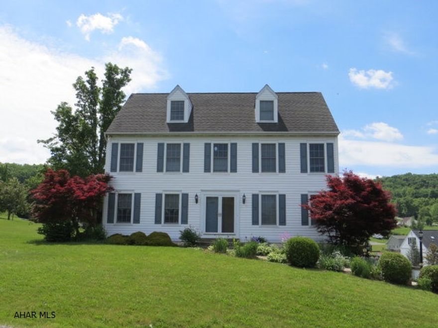 Re-Listed and better than ever!  The seller spared no expense updating this property to sell.  This home features 4 bedrooms, 3 full bathrooms and a half bath, with plenty of living space.  The semi-open floor plan offers the perfect environment for entertaining family and friends,  An exquisite great room was added to the property and features vaulted ceilings, and a beautiful electric fireplace. Step out onto the patio and unwind after a long day in the hot tub, included with the property.  Custom shelving accents a first floor office.  The second floor is spacious, and the bedrooms include lots of closet space.  The third floor contains the Master Bedroom and Bath, and is the perfect place to get away from it all.  Mountain views, closet space and a bonus room round out the third floor.