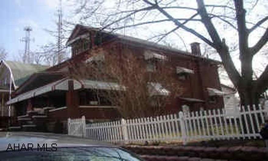 3 BEDROOM BRICK WITH 1 CAR DETACHED GARAGE. CHARMING 3 BEDROOM BRICK. BEAUTIFUL OPEN FRONT PORCH. LIVING ROOM WITH GAS FIREPLACE. LARGE ROOMS. FINISHED ATTIC. 1 CAR GARAGE. NICE YARD. ELECTRIC TO BE UPDATED TO 100 AMP.