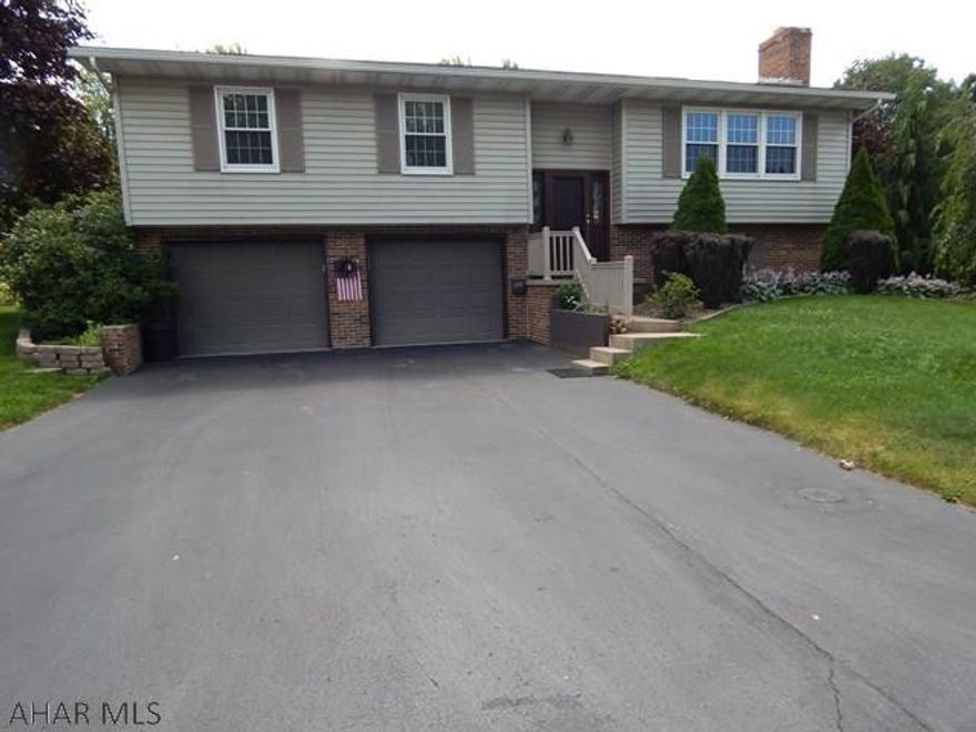 This beautiful home features a wide blacktop driveway leading to a 2 bay integral garage. The home is located in a desirable neighborhood and walking distance to the high school. The home also features 3 bedrooms, 1 full baths, 1 half bath, Hardwood floors, rear cement deck with gazebo, newer siding, updated windows, new roof installed in 2004. Nice flat back yard with shed, great for entertaining friends or family. Very clean and move in ready. Call listing agent to schedule a private tour today.