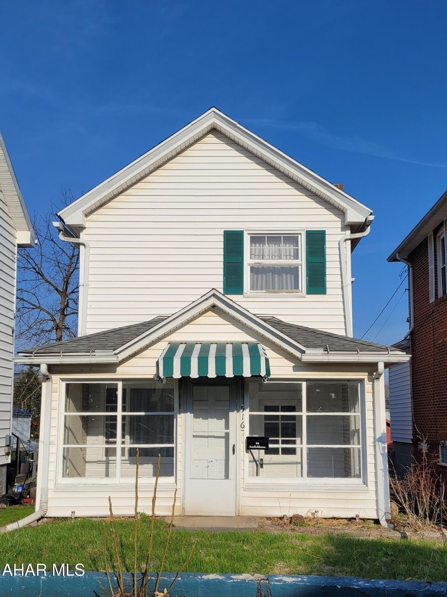 Quaint and affordable Altoona home for sale! On the first floor you will find a large living room and an eat in kitchen. There is brand new carpeting throughout the home! There is also an enclosed front AND back porch! The house is set back from the street just a bit, giving you the perfect opportunity for the cutest front garden you could dream of.  Upstairs, you will find two bedrooms, one bath, and a bonus area. The attic can be used for additional storage. Out back is a carport for an off-street parking opportunity! Don't wait, this cutie is priced to sell!