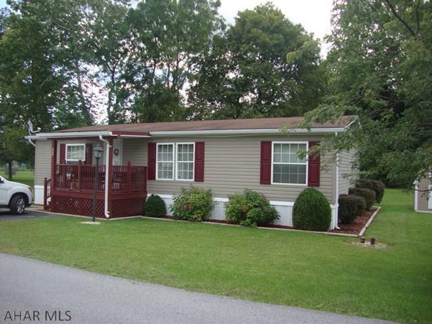 This well maintained double-wide in Independence Place displays real pride of ownership.  Even after 20 years this home is 'like new'.  Located in a quiet lovely neighborhood that backs up to Legion Park, this 3 bedroom, 1 bath home on rented lot has vaulted ceilings, eating area at the kitchen bar in addition to a dining room, and a laundry off of the kitchen.  Master bedroom has en suite bath.  Big open concept.  New Frigidaire gas range and new water heater.  Ductwork has been cleaned and sanitized.  New heating tape on water line. Built-in hutch in dining area and kitchen cabinetry.