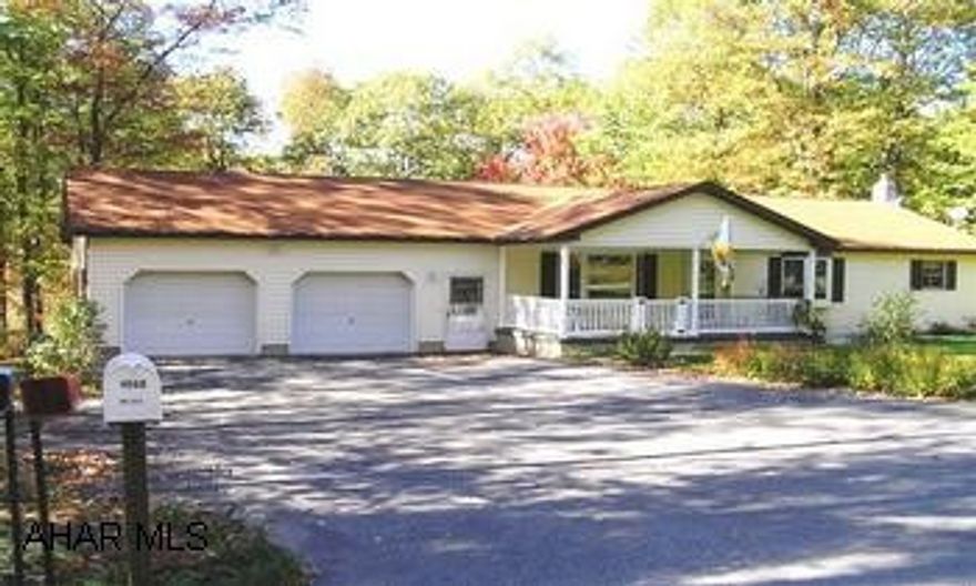 BEAUTIFUL 1996, 28X48 RANCH HOME.  BUILT BY BRUCE COX.  1.03 ACRE LOT.  MAINTENANCE FREE EXTERIOR, FENCED YARD. EXCEPTIONALLY WELL BUILT RANCH HOME, R-40 INSULATION, ELECTRIC HEAT PUMP WITH OIL HW BASEBOARD.  INCREDIBLY EFFICIENT HEATING SYSTEM.  WALKOUT FINISHED BASEMENT.  NEW FLOORING THROUGHOUT - HW, TILE AND CARPETING.  12X18 DECK WITH FRONT VIEW OF MOUNTAIN, 7X7 (5 PERSON) TIGER RIVE HOT TUB, FRONT PORCH 10X20 GATED, 4 FT. HALLWAYS.