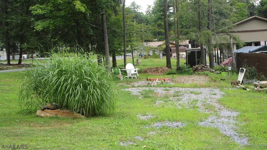 Nice vacant campsite to place your camper.