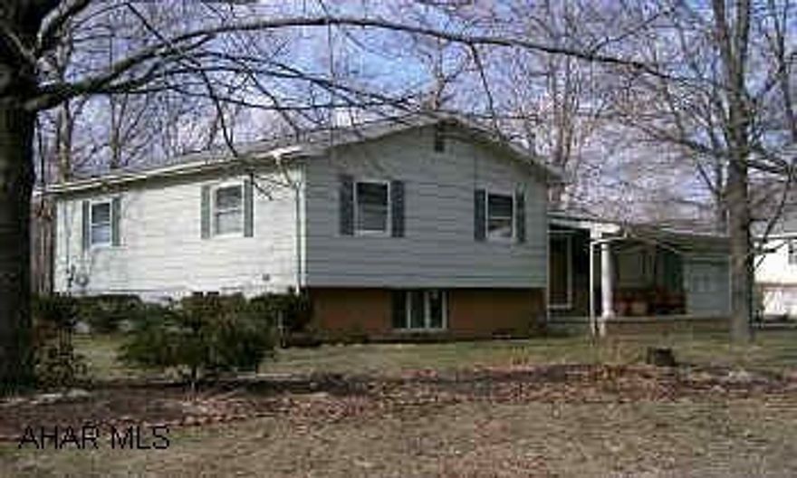 EXCEPTIONALLY WELL BUILT SPLIT LEVEL HOME.  3BR, 2BA, C/A, HEATED ENCLOSED PORCH, FINISHED FAMILY ROOM. NEWLY REMODELED KITCHEN WITH TILE FLOORS, SPACIOUS FAMILY ROOM IN BASEMENT WITH STONE GAS LOG FIREPLACE, GAS BASEBOARD HEAT, SKYLIGHTS THROUGHOUT.  1-1/2 CAR ATTACHED GARAGE, STORAGE SHEDS.