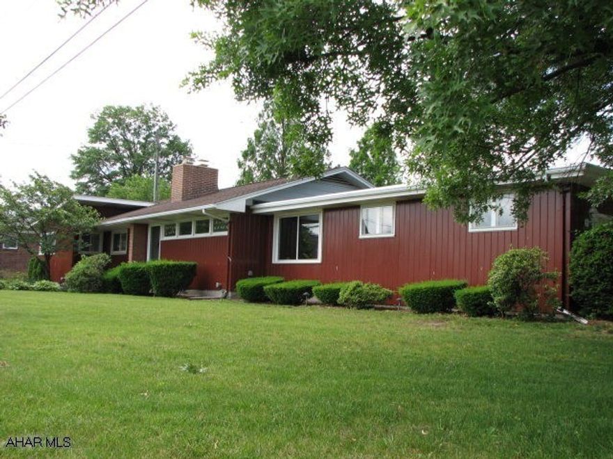 Easy 1 story living. Great location by Schools & YMCA. Nicely landscaped with Tussey Mt. Pond, Sunsetter awning over patio, bright & airy sunroom. Large breakfast area with storage pantry which could be converted to 1st floor laundry. Hardwood floors, gas Fp could be converted to woodburning, cedar closet, 2 car garage w/shelving.