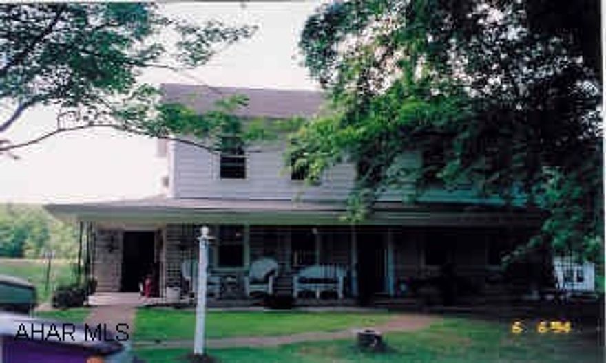 2-story tastefully remodeled home in peaceful country setting.