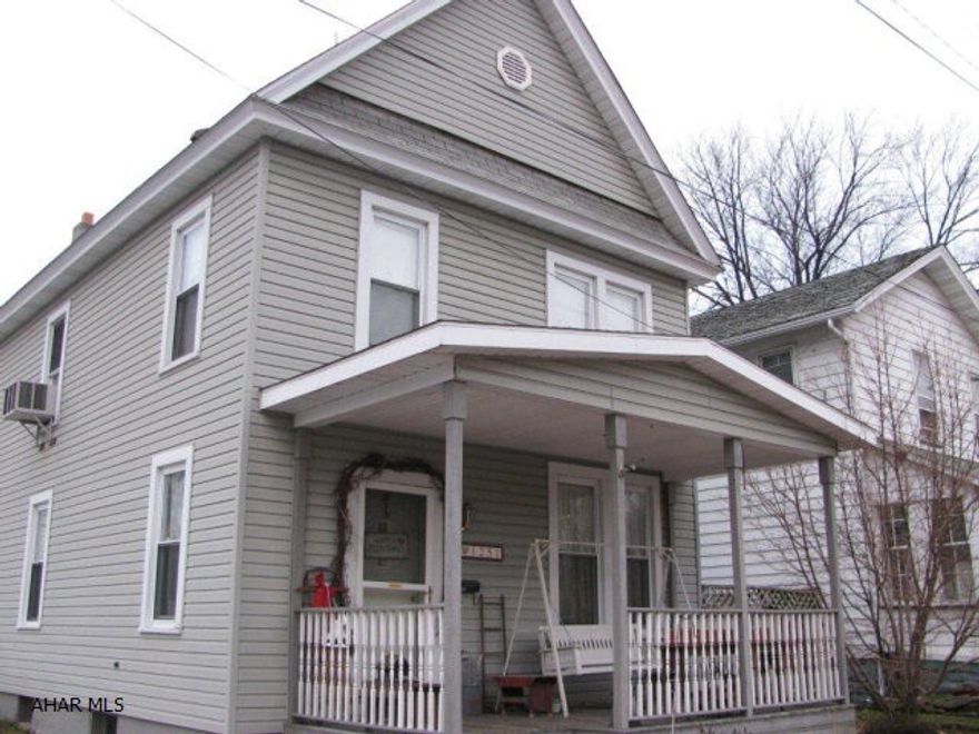 You'll be totally charmed by this adorable 2 1/2 story Tyrone home! LR w/ french doors, spacious Dr, EIK w/ updated cabintry and all appliances! 3 Br., w/ hardwood floors, Spacious recently updated bath, front and rear porchesplus patio to enjoy summer evenings! maintenance free vinyl siding and thermopane windows!