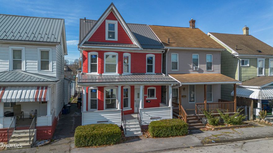 OPEN HOUSE Saturday from 12:00-1:30! Beautifully Remodeled, Move In Ready Home in a Prime Location! Welcome home to this stunning, fully remodeled 4 bedroom, 1.5 bath property where no detail has been spared. Step inside to find beautifully restored original hardwood floors flowing throughout the entire home, adding warmth and charm to every room. The spacious living room is filled with natural light thanks to its large, brand new windows and seamlessly connects to the dining room for easy entertaining. A newly added half bath on the main level provides convenient everyday living.The brand-new kitchen is sure to impress with its granite countertops, new appliances, and a charming breakfast nook perfect for casual meals and extra storage. Just off the kitchen, enjoy a covered outdoor area ideal for relaxing in the shade. The backyard also features a generous parking area large enough for multiple vehicles and even a camper. Upstairs, you'll find three comfortable bedrooms and a fully updated bathroom complete with a new vanity, toilet, and tub surround. The finished third floor offers an additional bedroom plus plenty of storage space. This home has been thoughtfully updated from top to bottom, including a new roof, new windows throughout, updated electrical, new siding, fresh interior and exterior paint, and beautifully refreshed landscaping. With its modern upgrades, classic charm, and unbeatable location, this home is one you don't want to miss!