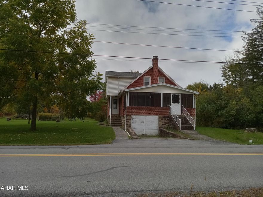 Live in 3 bedrm, 1 -1/2 bath home and rent the 2 small homes on this 2.28 acre lot! 2nd one has 1 bdrm, 1 ba; 3rd one has 2 bdrms, 
1 ba.  All 3 homes have updated furnaces, water heaters, stoves w/self-cleaning ovens, refrigeraters. 2nd and 3rd homes have washer & dryer and forced air heat. Rural setting just a couple of minutes' drive from town amenities.