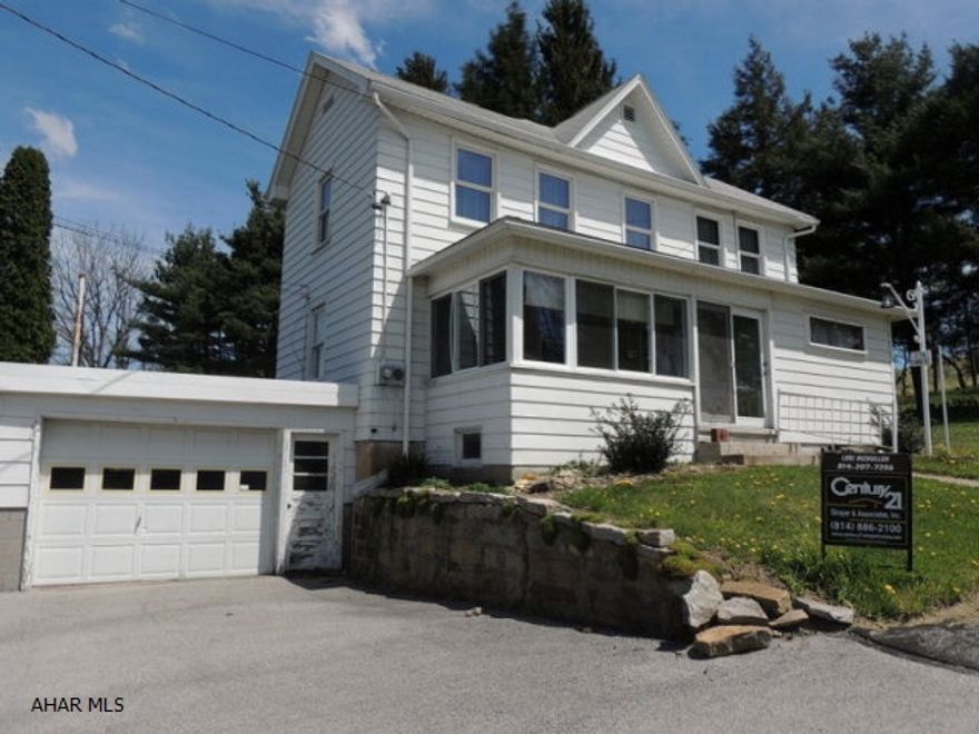 Large 4+ bedroom home on over 1.5 acres. hardwood floors under the carpet, 1 car attached garage, 2 car detached garage, large out building w/ many possibilities