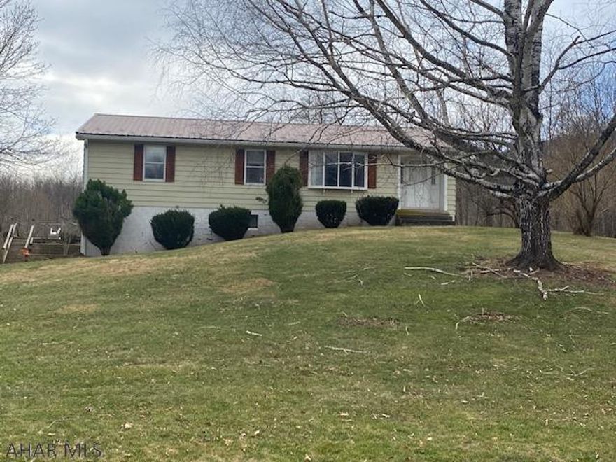 Three bedroom, 2 full bath ranch with full unfinished basement. Enclosed back porch, deck and lots of yard with a stream. Two car integral garage.
