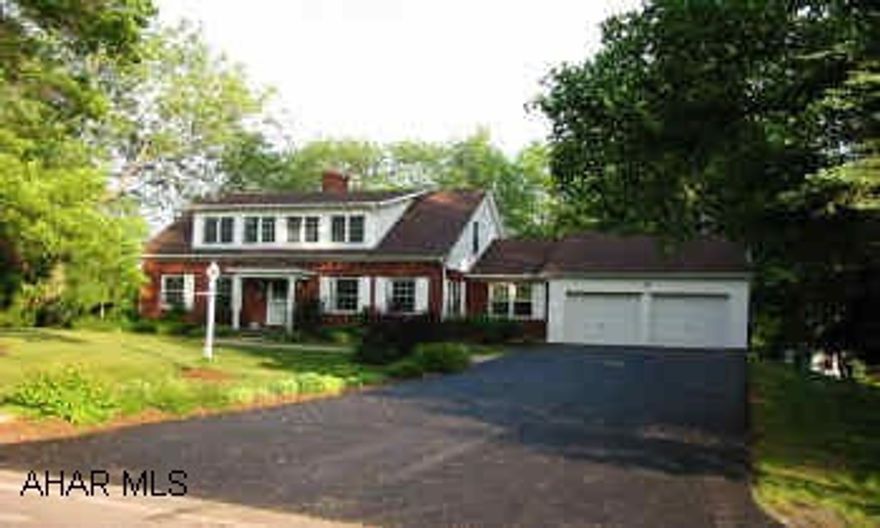 Lavish Master bedroom suite, recently added multi tier Cedar Tech deck with built in hot tub. Super kitchen, hardwood floors.