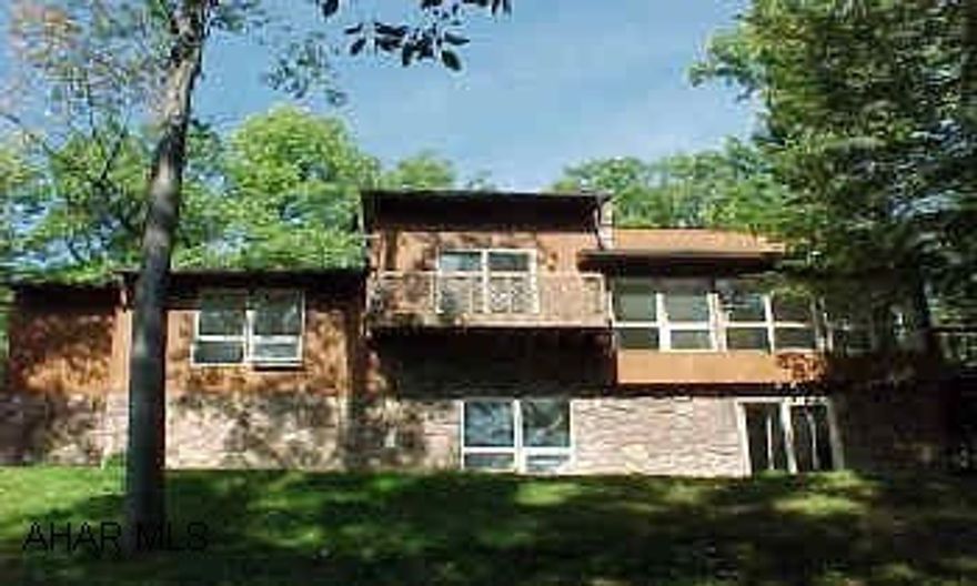 Unique contemporary/ranch w/sunken LR offering beautiful view. Vaulted ceilings, gameroom w/bar. New carpets throughout. Lots of closet space. Fantastic neighborhood, private back yard . Contractor to finish ceramic tile around whirlpool tub in bath and repair/replace tile in basement area.  Also deck to be resealed all contactors equipment will be out of house soon.  Any questions please call Aimee.  937-1878