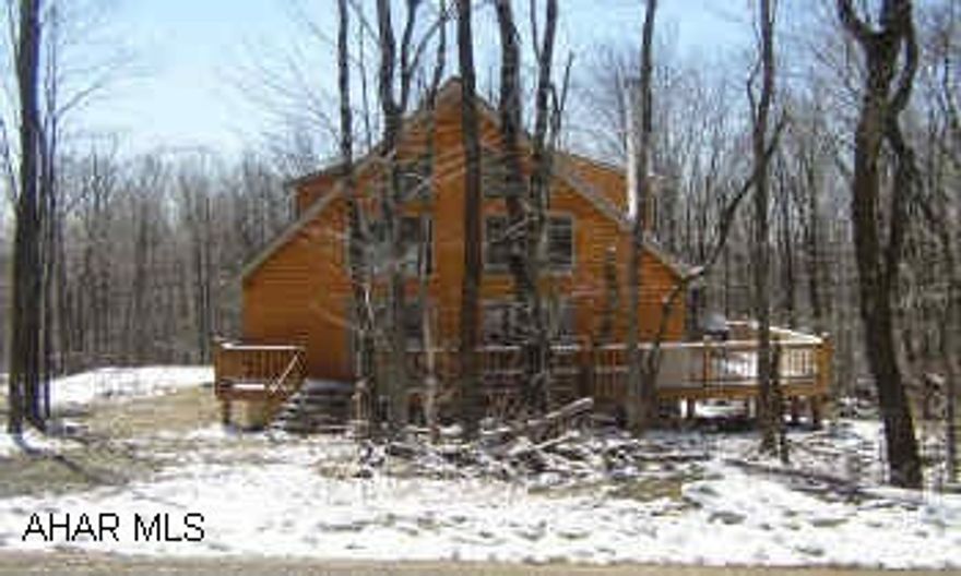 2 YEAR OLD LOG A-FRAME ON A LITTLE OVER 1 ACRE. 3 BEDROOM, 2 BATH, LOG 2 CAR GARAGE.  BEAUTIFUL OPEN GREAT ROOM WITH FIREPLACE. WRAP AROUND DECK. LARGE MASTER SUITE. MANY THINGS TO BE COMPLETED PRIOR TO CLOSING. CALL LA FOR LIST.