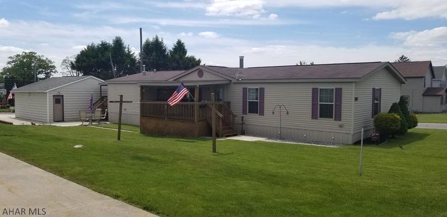 Come see this very spacious, very well maintained home on a corner lot! 3 bedroom all with walk-in closets. The master Suite features an extra-large walk-in closet, and a master bathroom with his-and-hers sinks, a corner soaking tub, and a stand up shower. The kitchen has an abundance of storage, and a large center island with a breakfast bar area. 2 car garage, 2 decks, and large double hung windows and skylights throughout to bring ample natural lighting!  Come see how spacious it is in person!