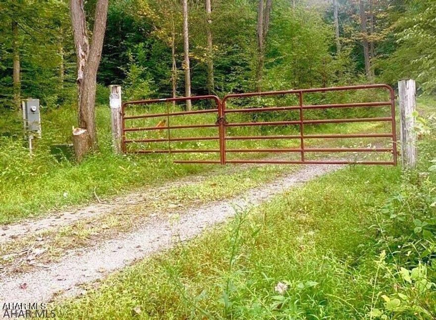 Clean and Green. This a beautiful piece of land located in Frankstown Township. 60 Acres ready for your homestead or hunting camp.
There are two building spots cleared with underground utilities.  A gated entrance with slate covered roadway runs through the property.  Underground Conduits are in place for future needs. Land was passed perc test but certificate has expired. Backs up to State Game lands