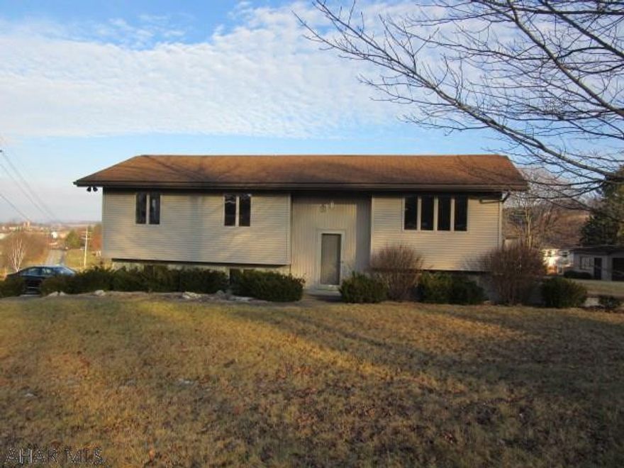 Great location on Newry Lane! spacious bi-level with addition off kitchen, huge living room, master bedroom with full bath, finished basement area and half bath, 3 car attached garage, some tlc will make this a perfect home