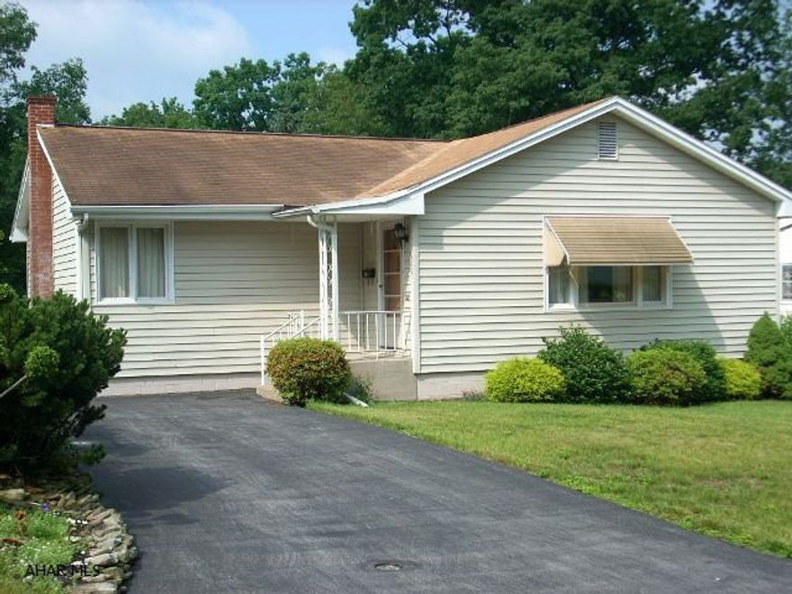 1-story ranch, vinyl siding, gas FA heat with central air, front and rear porches.  Very well maintained Borough home.