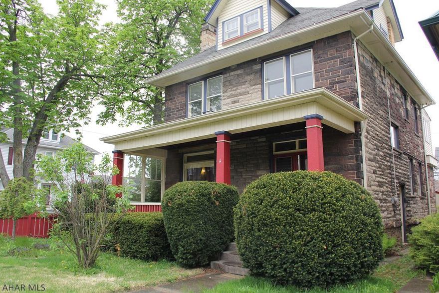Lg charming early 1900's, 2 1/2 Story Stone Home on a corner lot.  Quaint front porch, rear yard has perennial garden and pond.  One car garage.  Make it the home of your dreams today!!!
