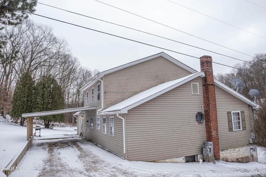 Freshly painted and move in ready home located right near the Penn State Altoona campus! Enter this home into the mudroom, perfect for storage of coats and shoes. The kitchen has plenty of cabinets and an open space that flows into the dining room. Cozy living area with a large bay window and tray ceiling. Two bedrooms and a full bathroom are located on the first floor. Enjoy the convenience of a first floor laundry room that doubles as a home office! On the second floor you will find the master bedroom, complete with a spacious closet and ensuite bathroom. An additional bonus room and another bedroom are on the second floor as well! Covered deck off of the living room, a carport, shed and additional parking complete the outside of the home! Dont miss out!