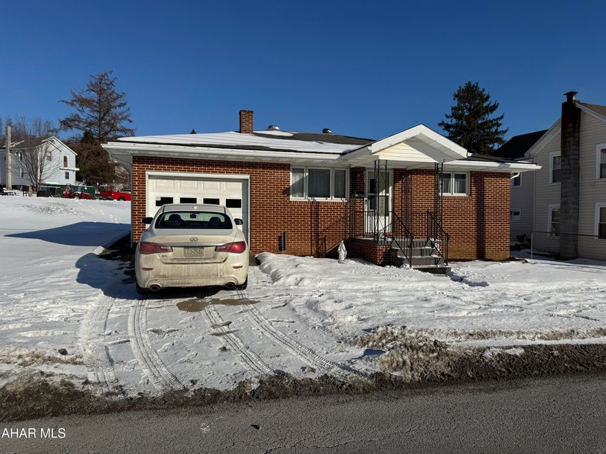 Attractive 2 bedroom brick rancher with attached garage. This home features Living room, eat in kitchen, and bath. Hardwood floors. Full basement with oil hw heat. Move in ready  - don't miss out on this hard to find type home!