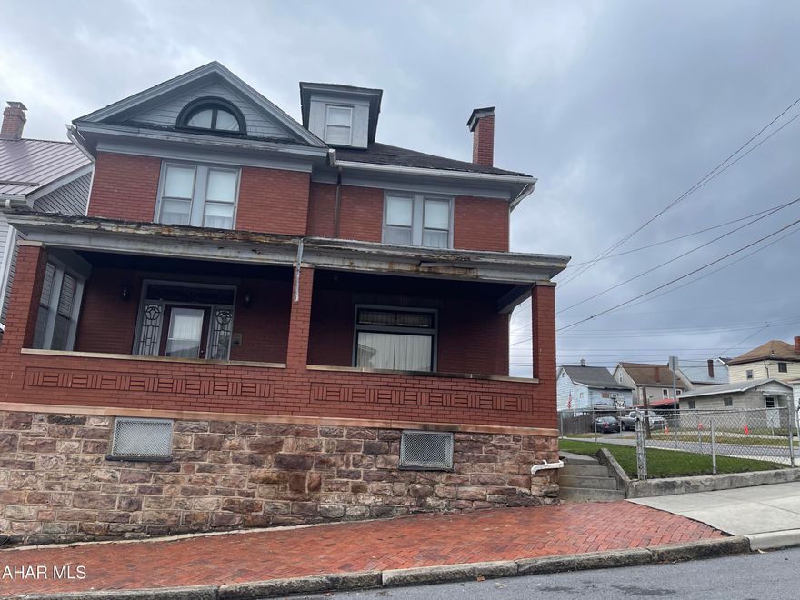 VERY spacious and lots of Charm still intact!  Beautiful hardwood flooring, Foyer, Cabinets in kitchen!  Well maintained!  Double corner lot and level.  Garage PLUS off street parking for all your guests.  Great place to start a family.  Close to shopping, banks, and hop onto I-99 in a jiffy!